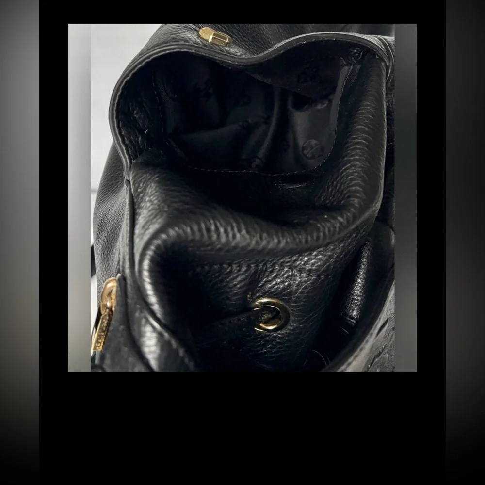 Tory Burch worn occasionally